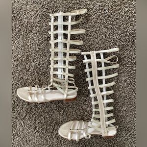 Stuart Weitzman Gladiator Sandal in Gold, size 8